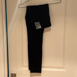 Skinny leg material and faux leather pant